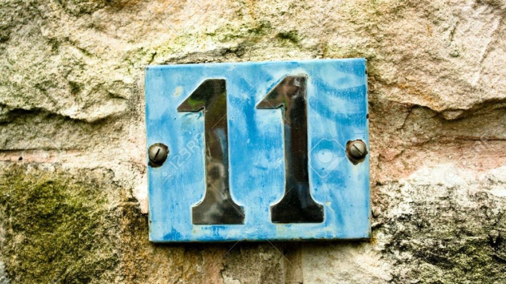 House number 11 symbol of alignment and balance.