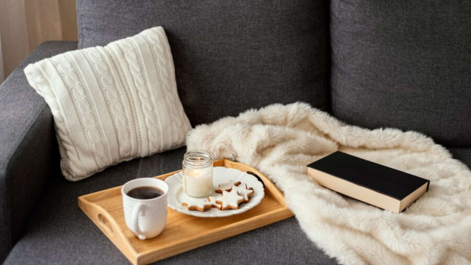 Get comfy! Put blankets on your couch for a cozy and warm feel.